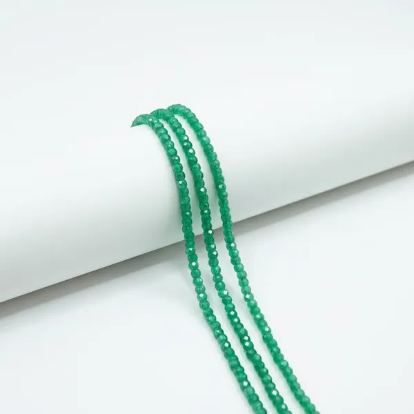 Green_Cubic_Zirconia_Beads_|_2×3mm_|_3_Strands_of_15_Inches_(~120_Beads_Each_Strand)