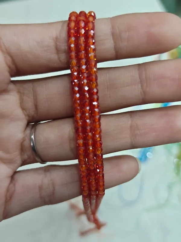 Dark_Orange_Cubic_Zirconia_Beads_|_2×3mm_|_3_Strands_of_15_Inches_(~120_Beads_Each_Strand)