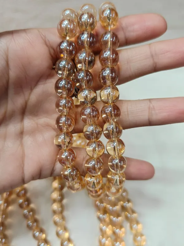 Golden_Transparent_Round_Glass_Beads_|_10mm_|_3_lines_(80_beads/line)