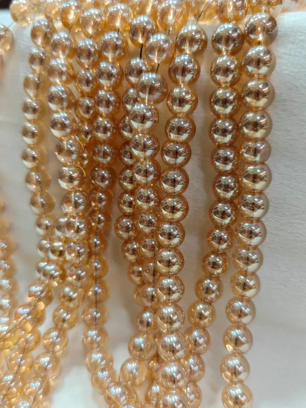 Golden_Transparent_Round_Glass_Beads_|_8mm_|_5_lines_(100_beads/line)
