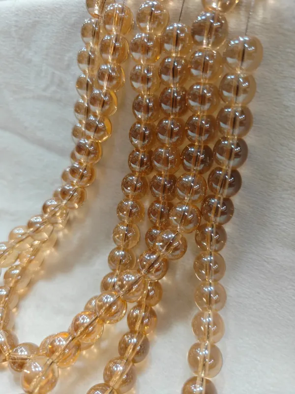 Golden_Transparent_Round_Glass_Beads_|_8mm_|_5_lines_(100_beads/line)