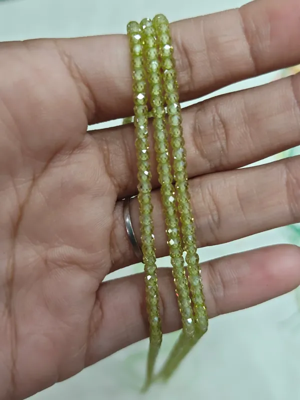 Olive_Cubic_Zirconia_Beads_|_2×3mm_|_3_Strands_of_15_Inches_(~120_Beads_Each_Strand)