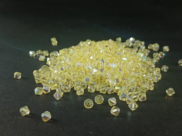 Genuine_Swarovski_Multicolour_Bicone_Crystal_Beads_|_5mm_|_36_Pcs