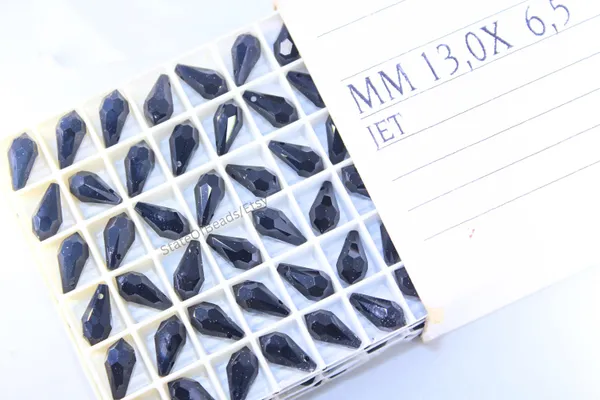 Genuine_Swarovski_Black_Teardrop_Charm_Beads_|_4_Pcs