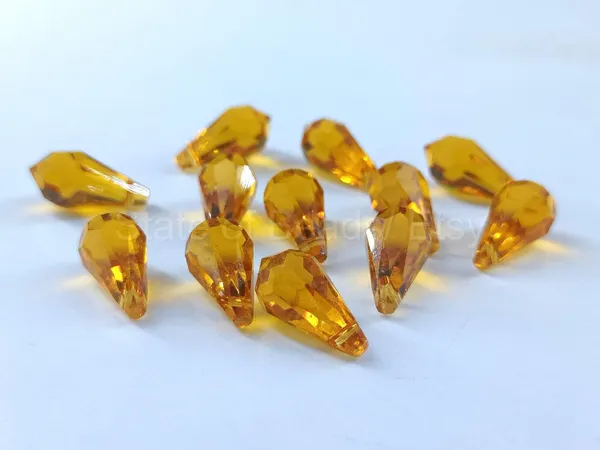 Genuine_Swarovski_Yellow_Teardrop_Charm_Beads_|_7.5mm_|_4_Pcs