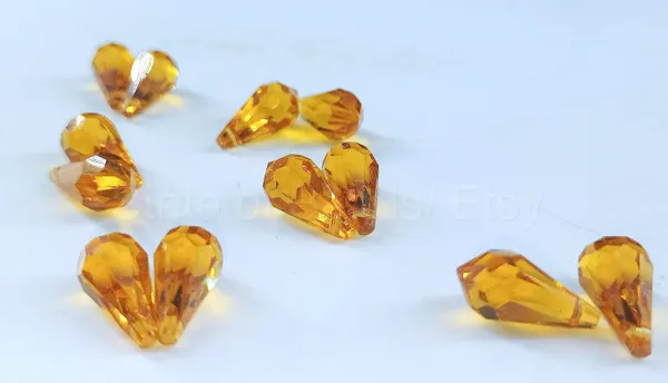 Genuine_Swarovski_Yellow_Teardrop_Charm_Beads_|_7.5mm_|_4_Pcs