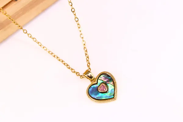 Star_in_the_Heart_|_18K_Gold_Plated_Shell_Heart_Pendant_Necklace_with_Pink_Cubic_Zirconia__|_1_Piece