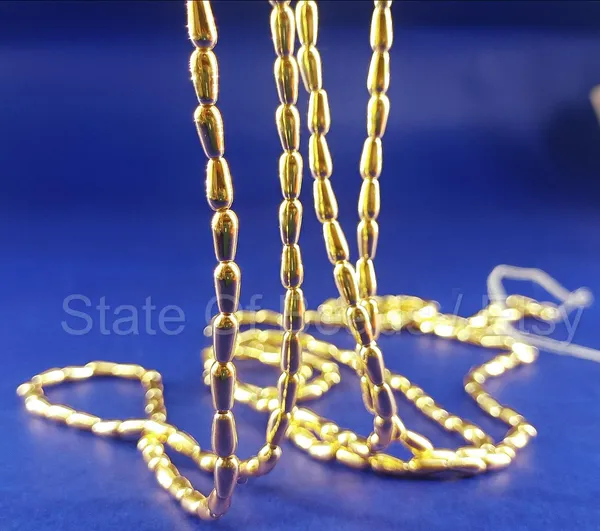 Golden_Gold_Plated_Pearl_Beads_|_1_strand_(60_Inches_Length_i.e_5_Feet_Length)