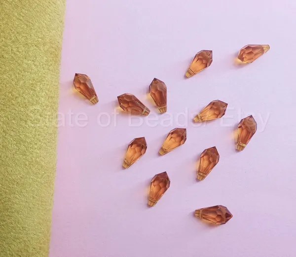 Genuine_Swarovski_Golden_Teardrop_Charm_Beads_|_5.5mm_|_4_Pcs