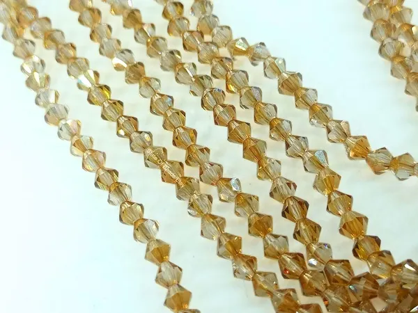 Genuine_Swarovski_Golden_Bicone_Crystal_Beads_|_4mm_|_36_Pcs