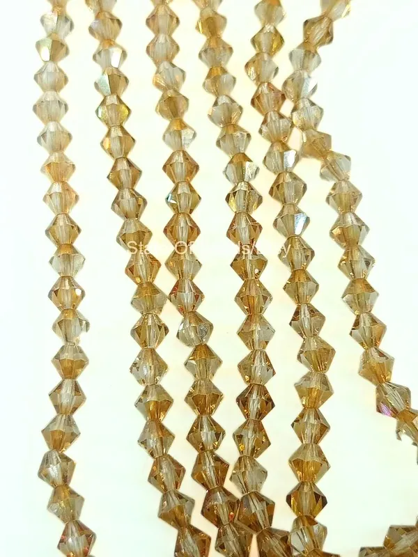 Genuine_Swarovski_Golden_Bicone_Crystal_Beads_|_4mm_|_36_Pcs