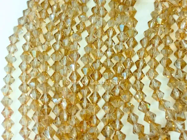 Genuine_Swarovski_Golden_Bicone_Crystal_Beads_|_4mm_|_36_Pcs