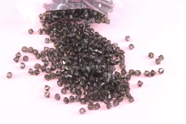 Genuine_Swarovski_Light_Pink_Bicone_Crystal_Beads_|_4mm_|_36_Pcs