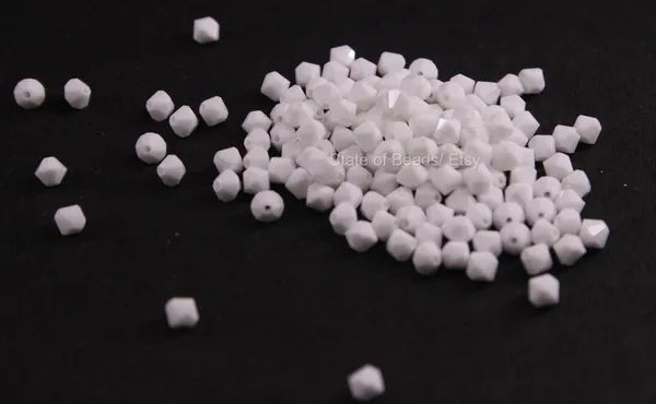 Genuine_Swarovski_White_Bicone_Crystal_Beads_|_4mm_|_36_Pcs