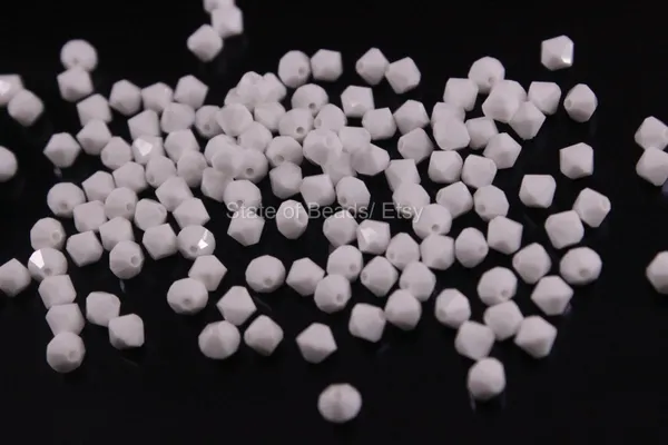 Genuine_Swarovski_White_Bicone_Crystal_Beads_|_4mm_|_36_Pcs