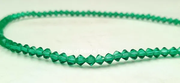 Genuine_Swarovski_Green_Bicone_Crystal_Beads_|_4mm_|_1_Pcs