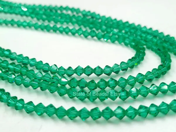 Genuine_Swarovski_Green_Bicone_Crystal_Beads_|_4mm_|_1_Pcs