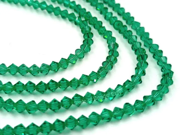 Genuine_Swarovski_Green_Bicone_Crystal_Beads_|_4mm_|_1_Pcs