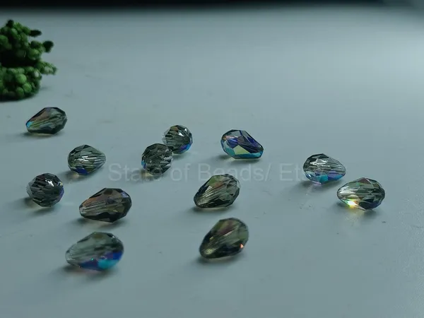 Genuine_Swarovski_Grey_Teardrop_Charm_Beads_|_6.5mm_|_4_Pcs