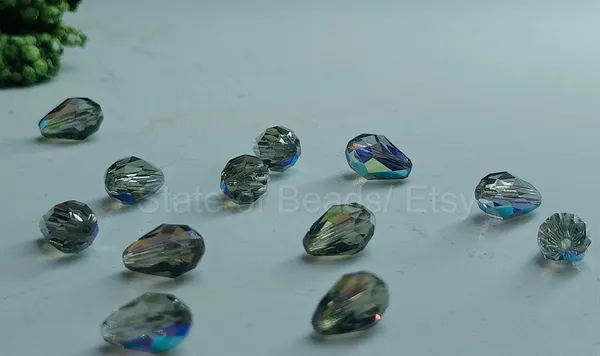 Genuine_Swarovski_Grey_Teardrop_Charm_Beads_|_6.5mm_|_4_Pcs