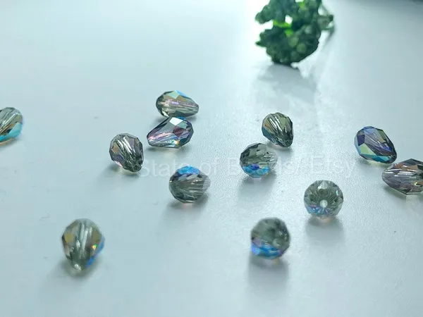 Genuine_Swarovski_Grey_Teardrop_Charm_Beads_|_6.5mm_|_4_Pcs