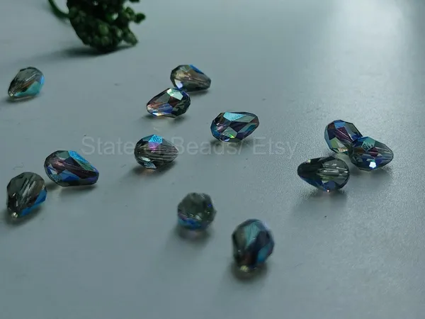 Genuine_Swarovski_Grey_Teardrop_Charm_Beads_|_6.5mm_|_4_Pcs
