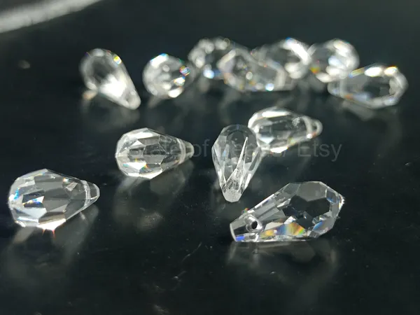 Genuine_Swarovski_Transparent_Teardrop_Charm_Beads_|_6.5mm_|_4_Pcs