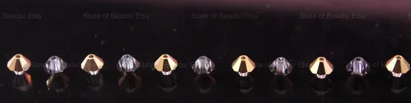Swarovski_Crystal_Dorado_Bicone_Beads_4mm_|_36_Pieces