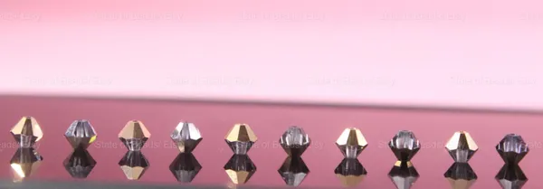 Swarovski_Crystal_Dorado_Bicone_Beads_4mm_|_36_Pieces