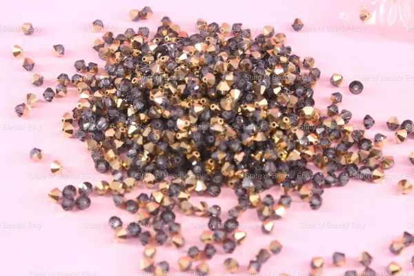 Swarovski_Crystal_Dorado_Bicone_Beads_4mm_|_36_Pieces