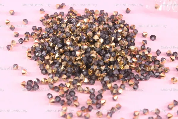 Swarovski_Crystal_Dorado_Bicone_Beads_4mm_|_36_Pieces