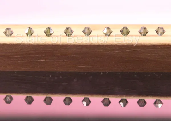 Swarovski_Crystal_Dorado_Bicone_Beads_4mm_|_36_Pieces