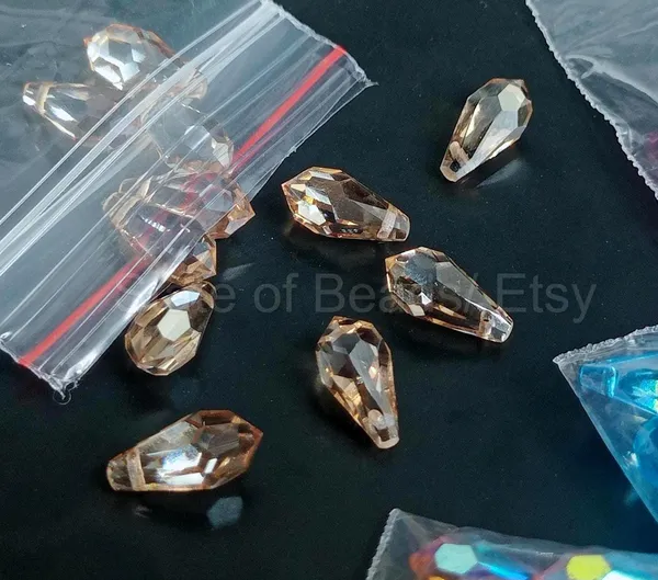 Genuine_Swarovski_Brown_Teardrop_Charm_Beads_|_6.5mm_|_4_Pcs