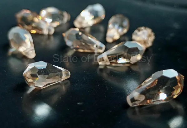 Genuine_Swarovski_Brown_Teardrop_Charm_Beads_|_6.5mm_|_4_Pcs