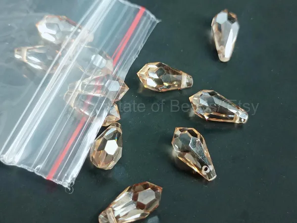 Genuine_Swarovski_Brown_Teardrop_Charm_Beads_|_6.5mm_|_4_Pcs