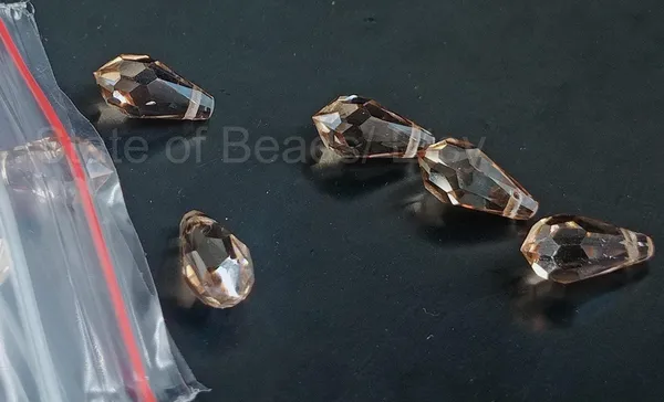 Genuine_Swarovski_Brown_Teardrop_Charm_Beads_|_6.5mm_|_4_Pcs