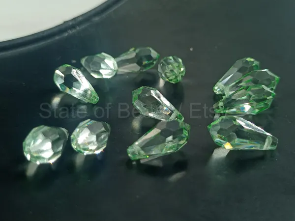 Genuine_Swarovski_Green_Teardrop_Charm_Beads_|_7.5mm_|_4_Pcs