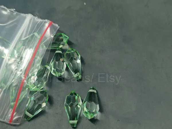 Genuine_Swarovski_Green_Teardrop_Charm_Beads_|_7.5mm_|_4_Pcs