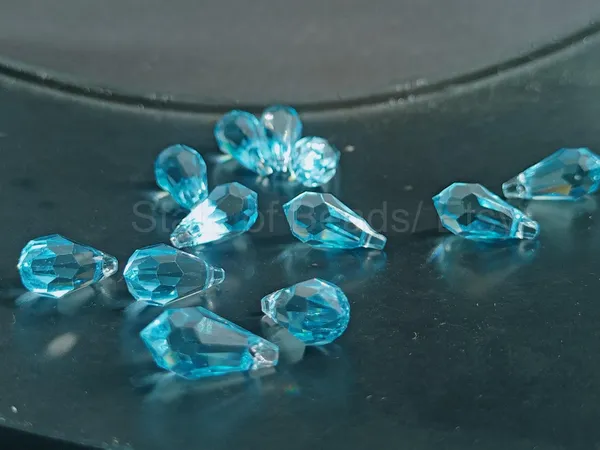 Genuine_Swarovski_Sky_Blue_Teardrop_Charm_Beads_|_7.5mm_|_4_Pcs