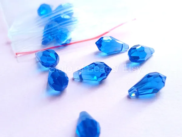 Genuine_Swarovski_Blue_Teardrop_Charm_Beads_|_6.5mm_|_4_Pcs