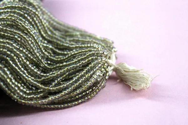 Green_Transparent_Glass_Seed_Beads_|_2mm_|_1_Bunch