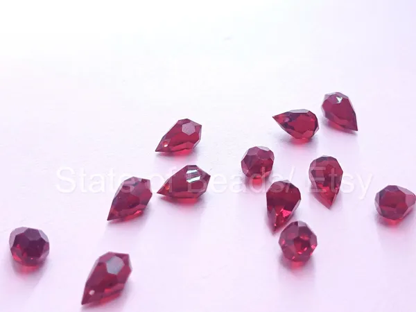Genuine_Swarovski_Red_Teardrop_Charm_Beads_|_5.5mm_|_4_Pcs