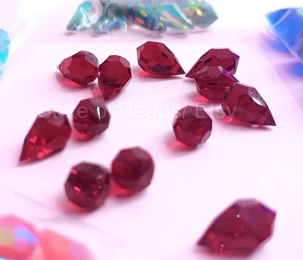 Genuine_Swarovski_Red_Teardrop_Charm_Beads_|_5.5mm_|_4_Pcs