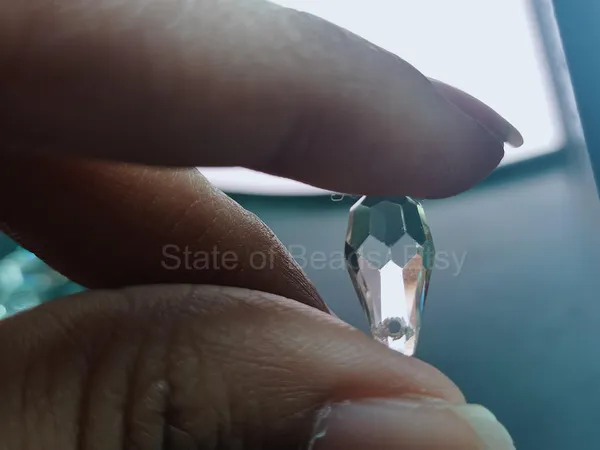 Genuine_Swarovski_Transparent_Teardrop_Charm_Beads_|_6.5mm_|_4_Pcs