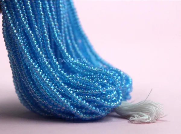 Sky_Blue_Transparent_Glass_Seed_Beads_|_2mm_|_1_Bunch