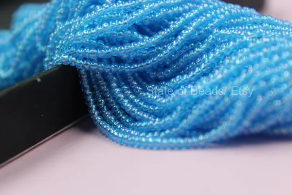 Sky_Blue_Transparent_Glass_Seed_Beads_|_2mm_|_1_Bunch