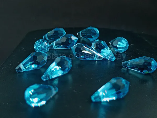 Swarovski_Sky_Blue_Teardrop_Drop_Charms_13_6.5Mm_Side_Drill_|_4_Pieces