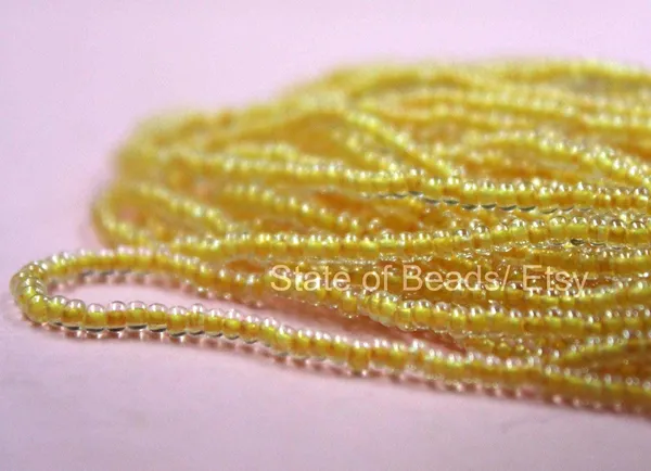 Yellow_Transparent_Glass_Seed_Beads_|_2mm_|_1_Bunch