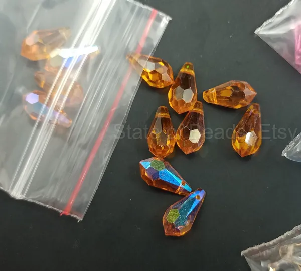 Genuine_Swarovski_Orange_Teardrop_Charm_Beads_|_6.5mm_|_4_Pcs