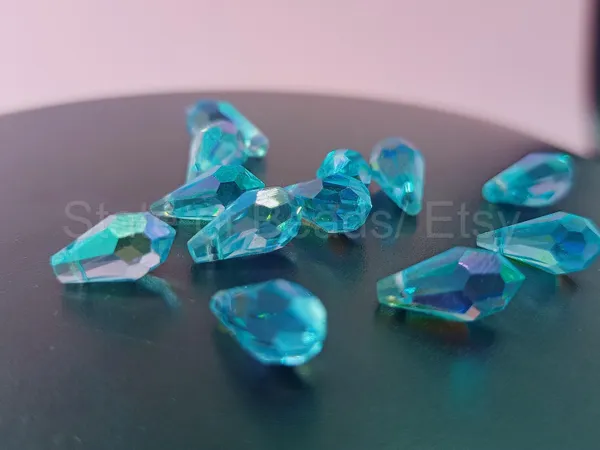 Genuine_Swarovski_Sky_Blue_Teardrop_Charm_Beads_|_5.5mm_|_4_Pcs